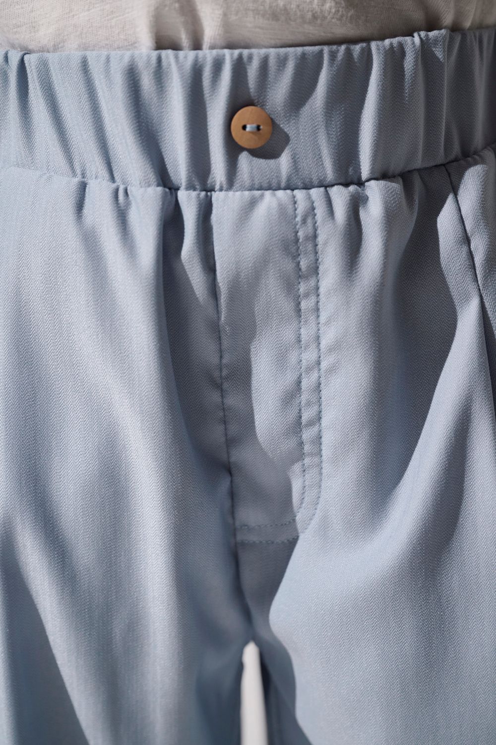 Pantalon anti-UV - Faro bleu clair pour enfant, léger et confortable, offrant une protection solaire UPF 50+.