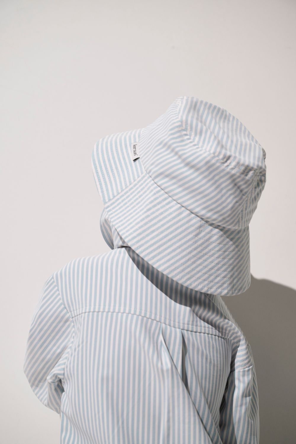 Bob anti-UV - Sylt rayé bleu pour enfant, léger et UPF 50+ pour une parfaite protection solaire.