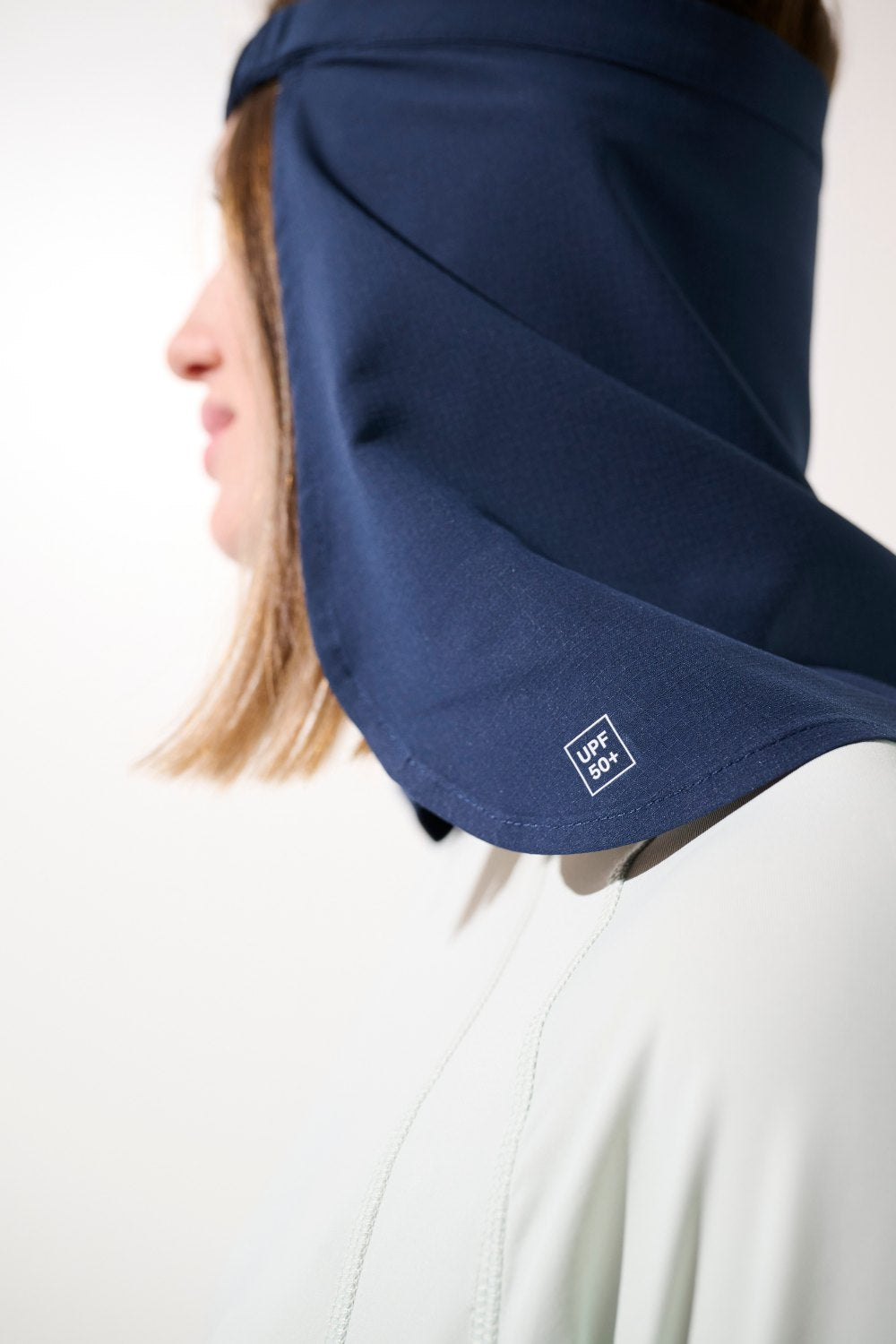 Cache-nuque anti-UV - Gobi navy pour femme, léger et UPF 50+, idéal pour la protection solaire.