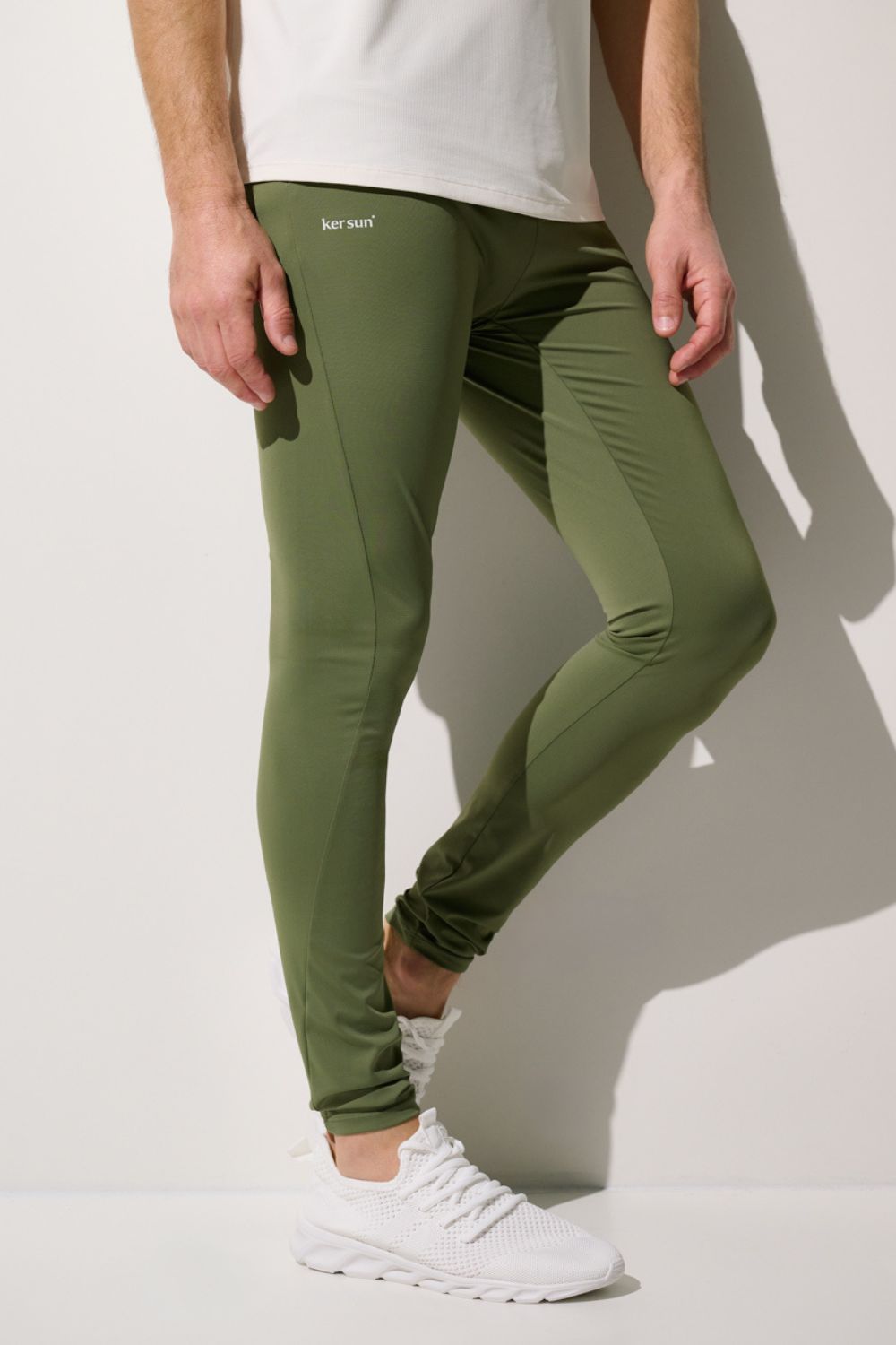 Legging anti-UV Boston pour homme, en vert, offrant protection solaire UPF 50+ et confort pour activités sportives.