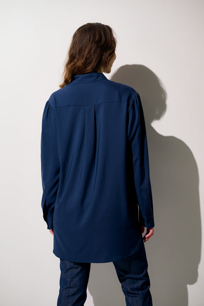 Chemise longue anti-UV - Faro en bleu marine pour femme, élégante et légère, parfaite pour activités de plein air.