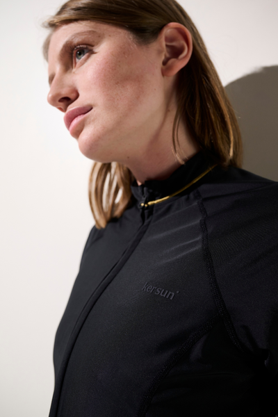 Veste de bain anti-UV - Malta pour femme, noire, légère, respirante, parfaite pour baignade et sports aquatiques.
