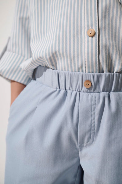 Pantalon anti-UV - Faro bleu clair pour enfant, léger et confortable, idéal pour jouer en extérieur.