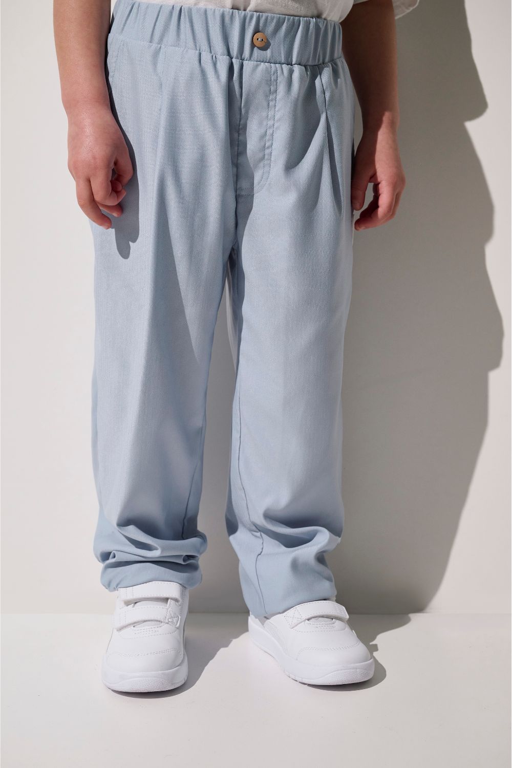 Pantalon anti-UV - Faro bleu clair pour enfant, léger et confortable, parfait pour jouer au soleil avec protection UPF 50+.