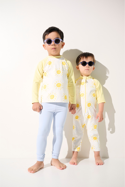 Combinaison de bain anti-UV - Pacific pour enfants, tissu léger UPF 50+, idéal pour jouer au soleil.