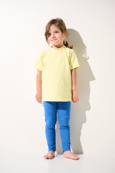 T-shirt de bain anti-UV - Fidji pour enfant, jaune, léger et respirant, offrant protection solaire UPF 50+.