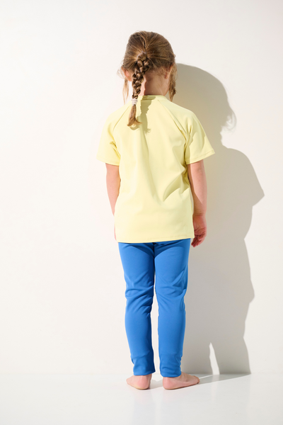 T-shirt de bain anti-UV - Fidji jaune pour enfant, léger et UPF 50+, parfait pour les activités aquatiques.