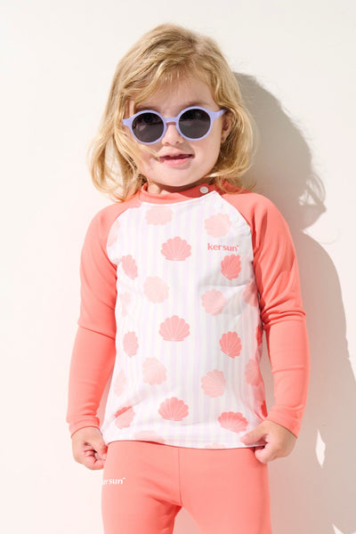 T-shirt de bain anti-UV - Samoa rose pour enfant, UPF 50+, parfait pour jouer au soleil à la plage.