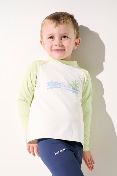T-shirt de bain anti-UV - Fidji pour enfant, manches longues, UPF 50+, coloris vert clair et blanc, idéal pour la plage.